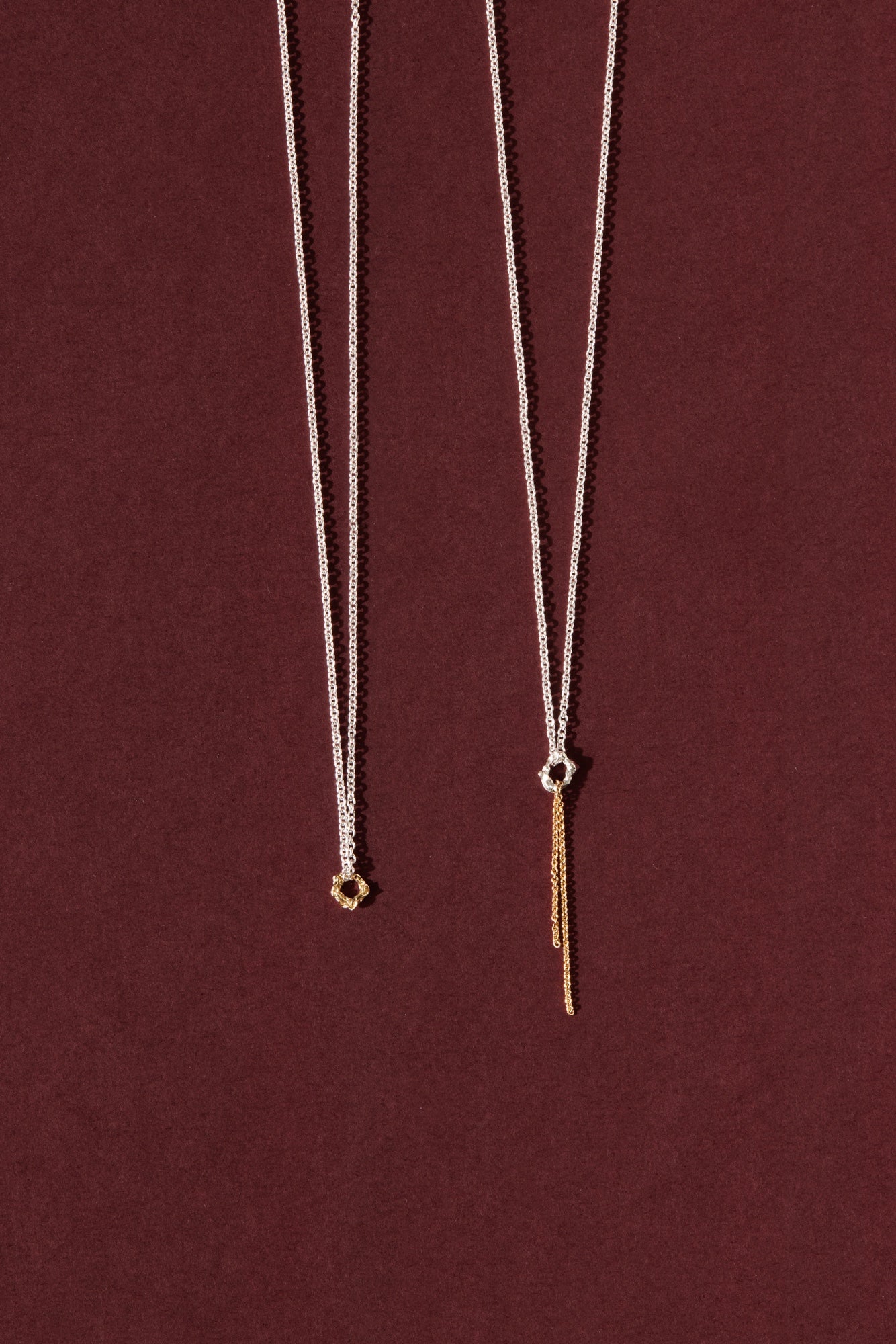 Two delicate chain with charm necklaces in silver and 10k yellow gold by Camillette Jewelry