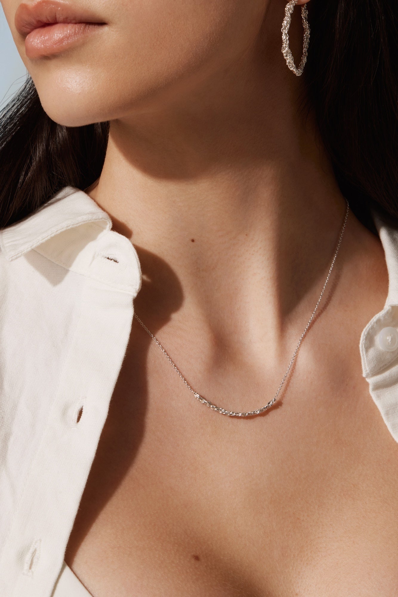 Large silver textured hoops with the small silver fusion necklace handmade in Canada by Camillette Jewelry