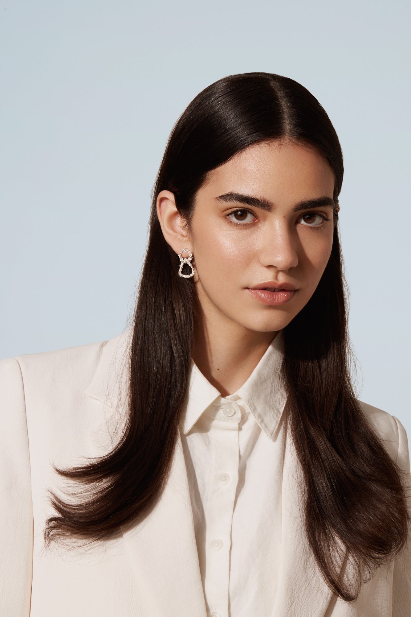 Intertwined medium drop earrings